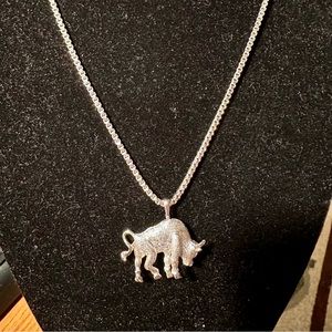 Silver tone bull on silver tone 8 inch chain. Great gift for a Taurus